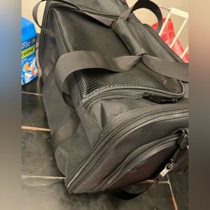 Small/medium pet carrier. Travel with your fur baby securely and comfortably!